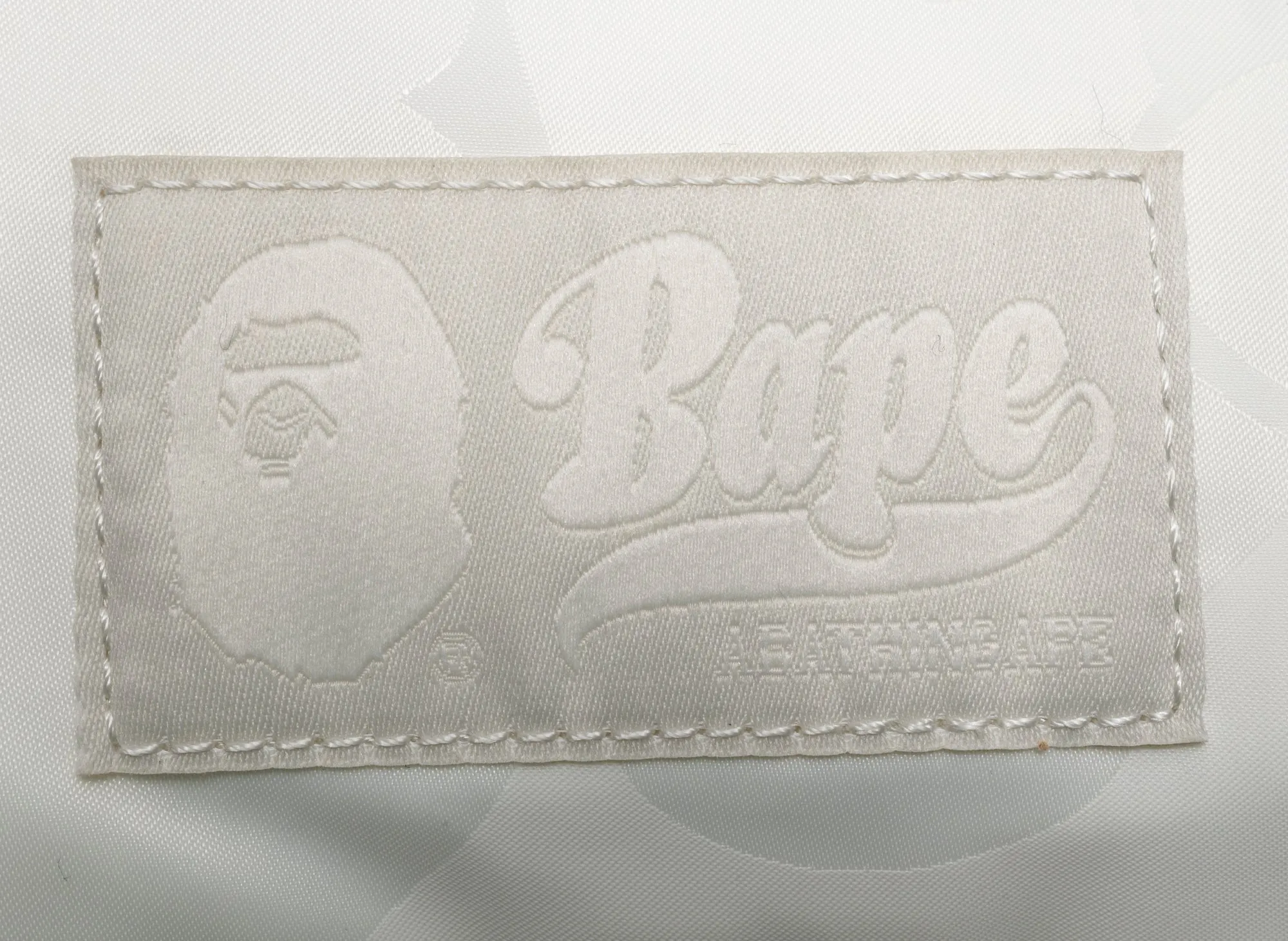 A Bathing Ape Tonal Solid Camo Shoulder Bag in Ivory