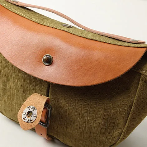 Saddle style canvas leather bag